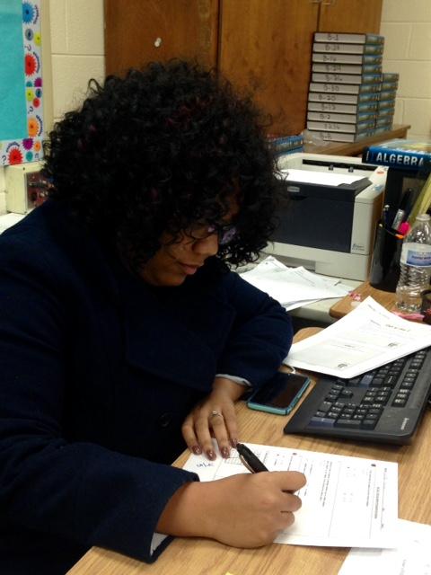 Hardworking new teacher Patrina Bly grades her students work as soon as possible. 