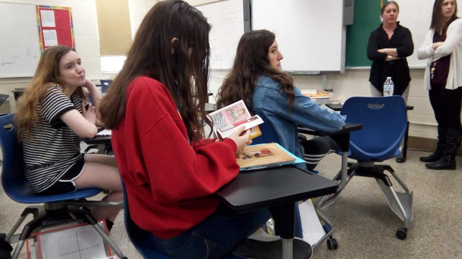 Students reviewing fundraising materials during a Behind the Scenes meeting on January 29, 2019.