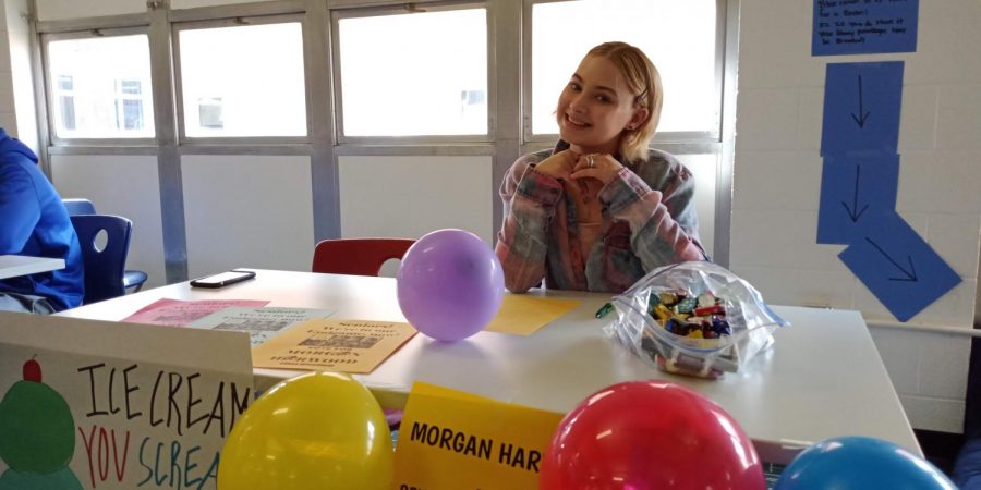 Morgan+Harwood%2C+junior%2C+at+her+table+during+the+Meet+the+Candidates+event+on+Friday%2C+March+22%2C+2019.+Harwood+is+running+for+senior+class+president.+