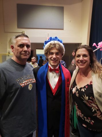 Liam Besserer, Mr. Kempsville 2019, with his parents after the pageant. 