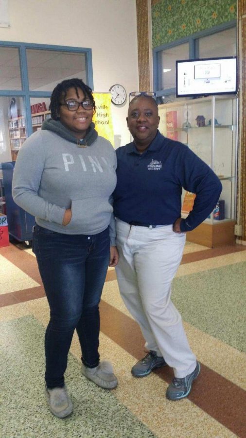 Asia Tonia stands with her mentor, Ms. Beverly Baker.