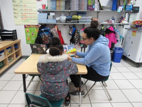 The Interact Club Volunteers to Aid Students in Reading