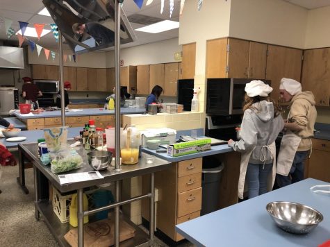 Students in catering making homemade Gnocchi with different sauces and toppings.