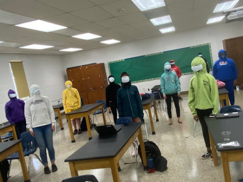 Students dress as Among Us avatars for Halloween Day.